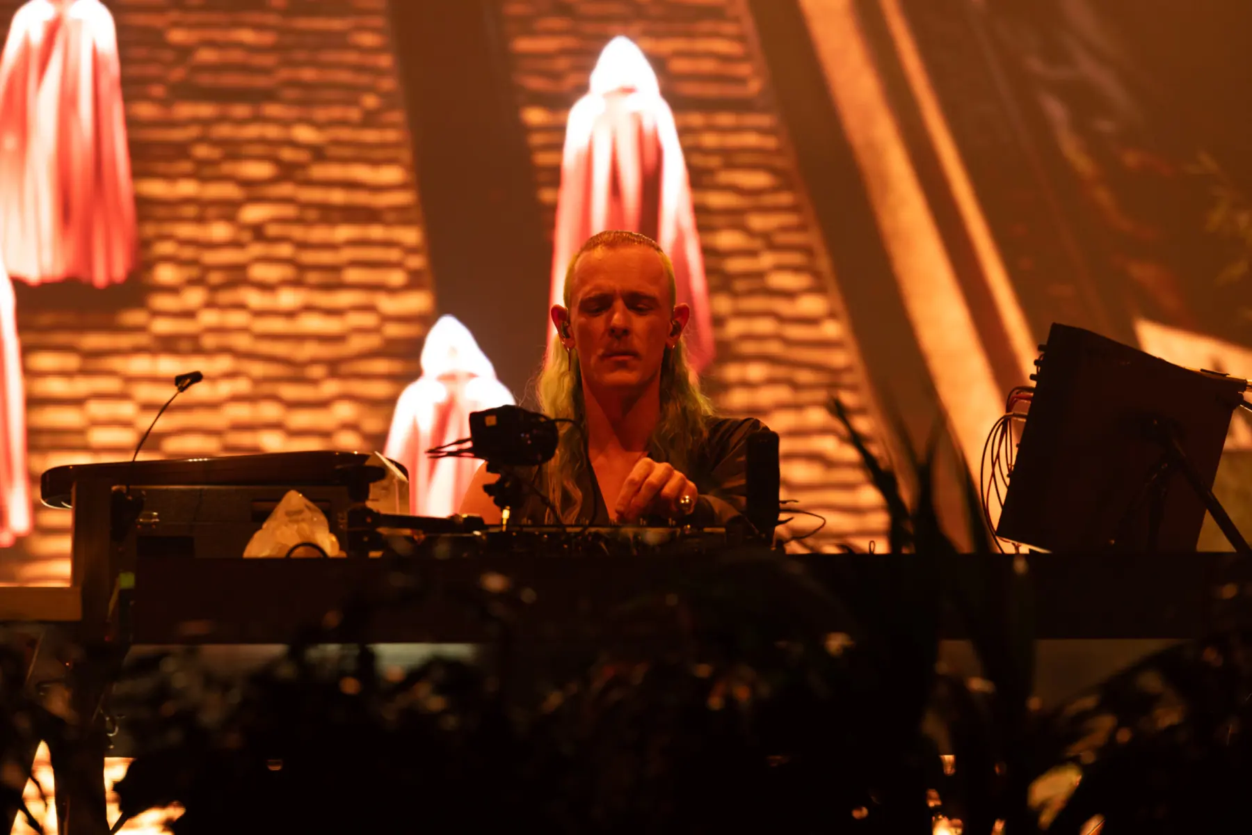 Mace live under warm stage lights